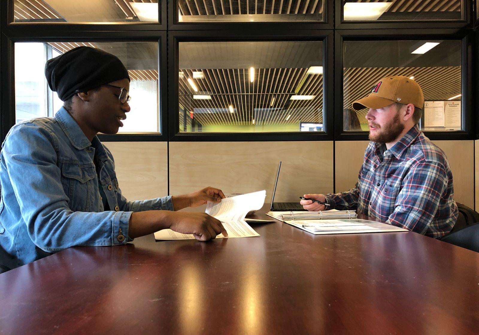 Students sitting across from each other