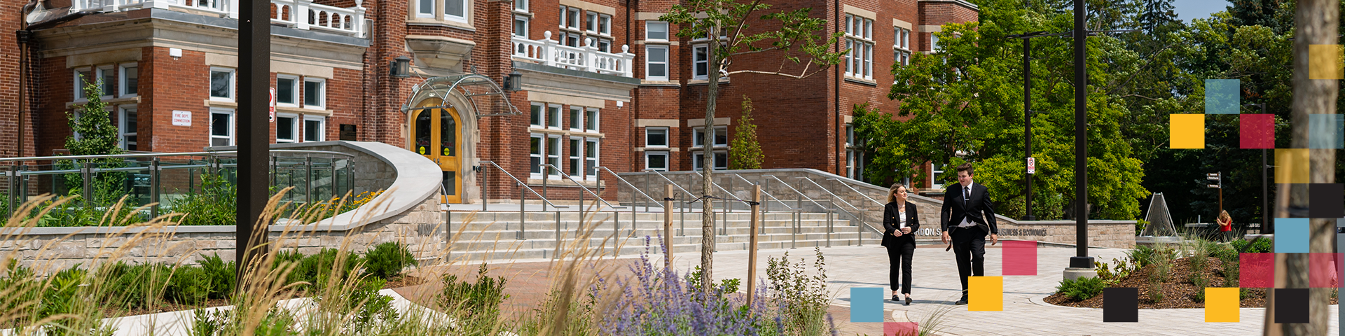 commerce students talking to each other in Lang Plaza