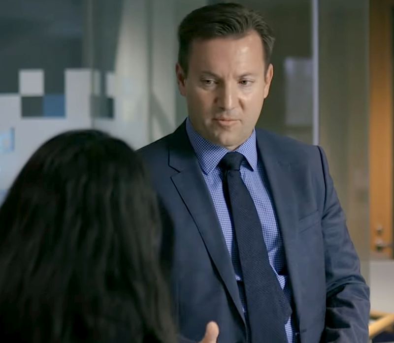 faculty member talking to student