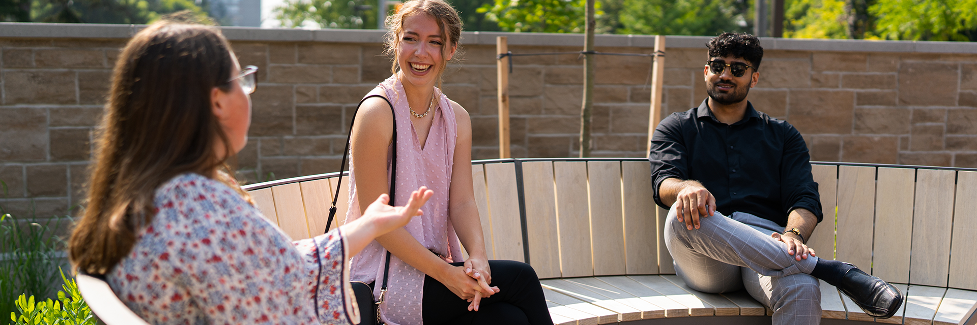 students talking in Lang Plaza