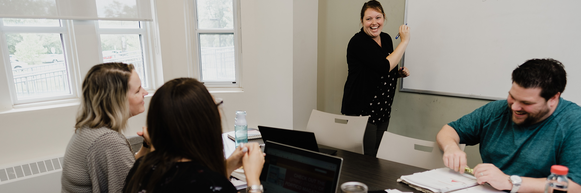 students working together in meeting room