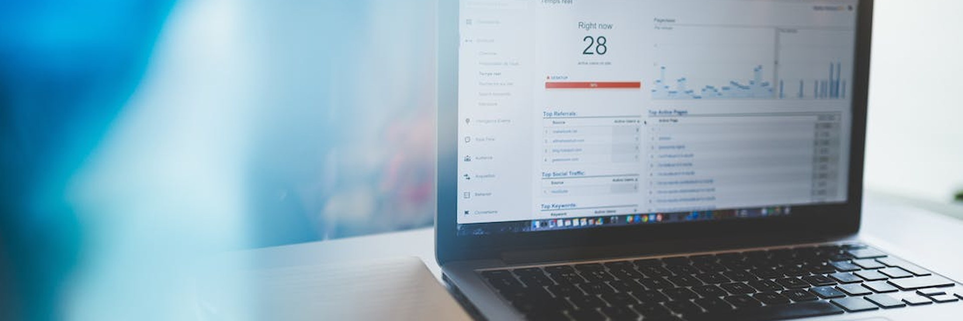 a photo of a laptop with analytics on the screen