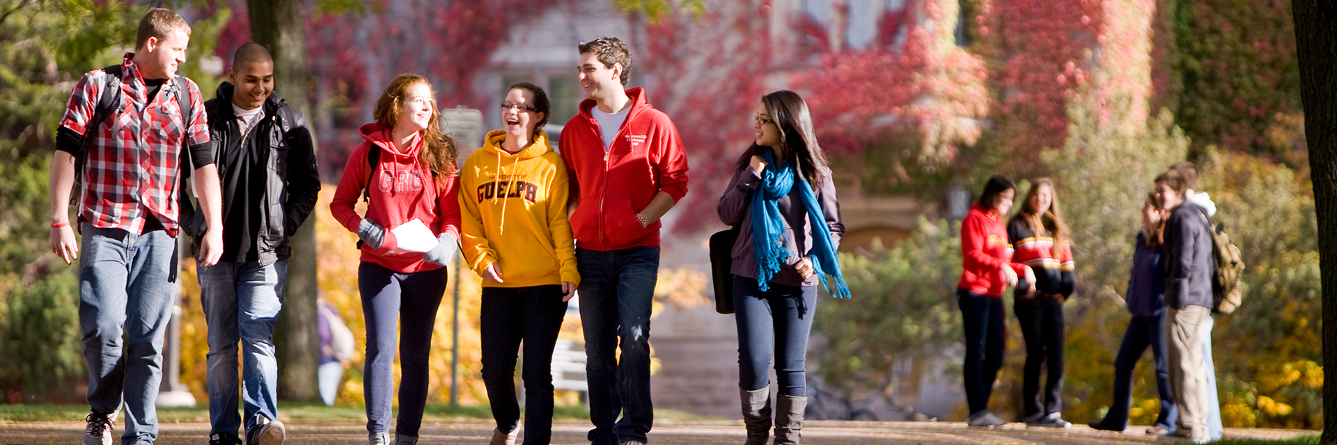 students walking and talking outside of johnston hall