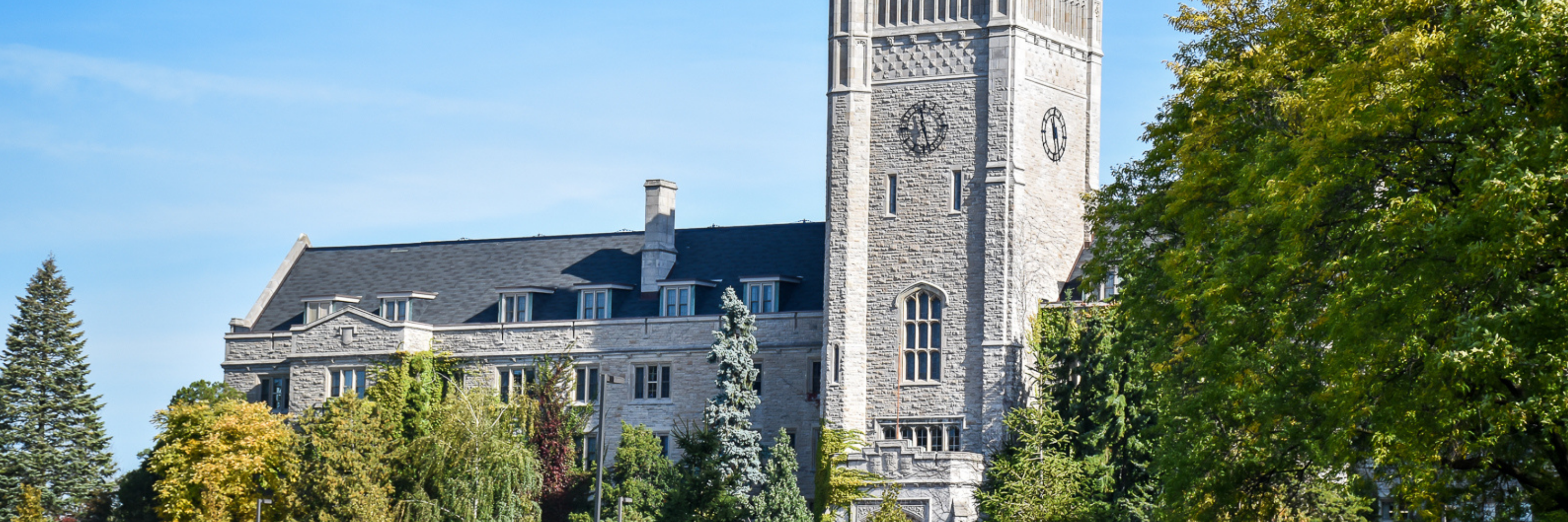 The front of Johnston Hall with a clear blue sky in the background