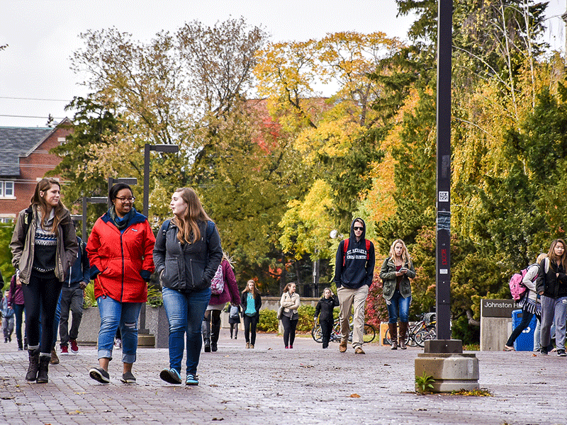Students walking on pathway on the University of Guelph campus