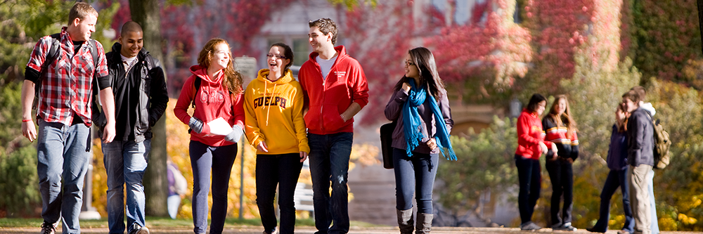 students on the uofguelph campus walking outside