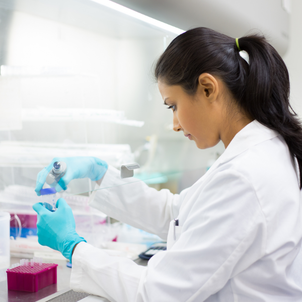 researcher working in lab hood