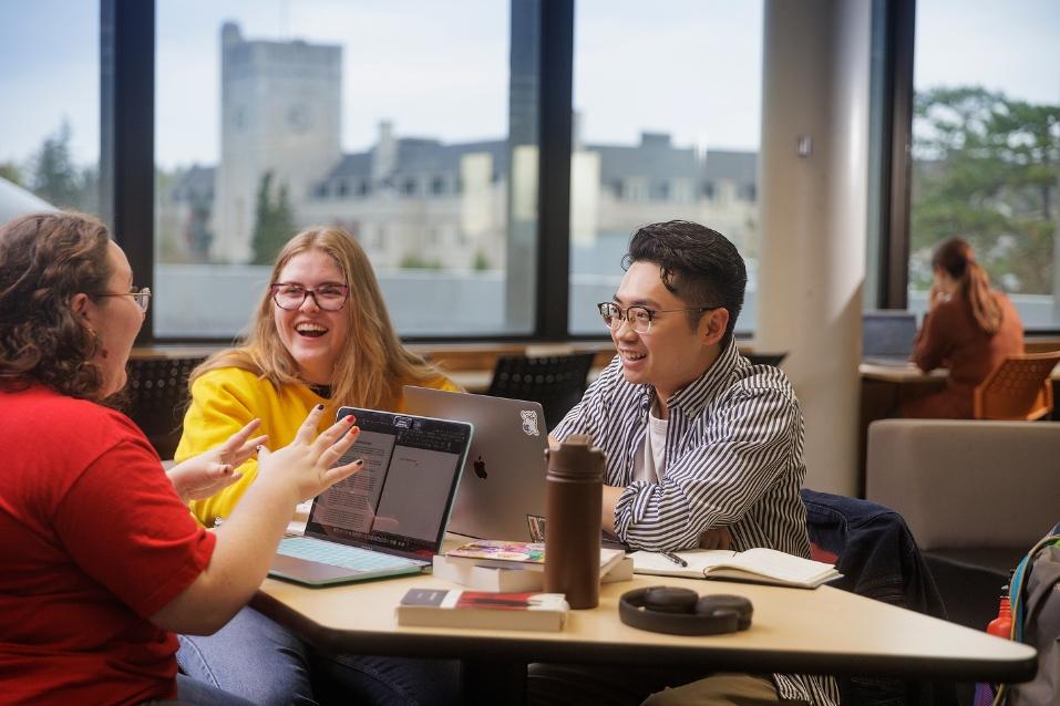 3 students in the library