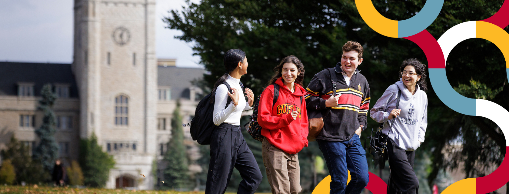 Four students on Johnston Green with colourful design