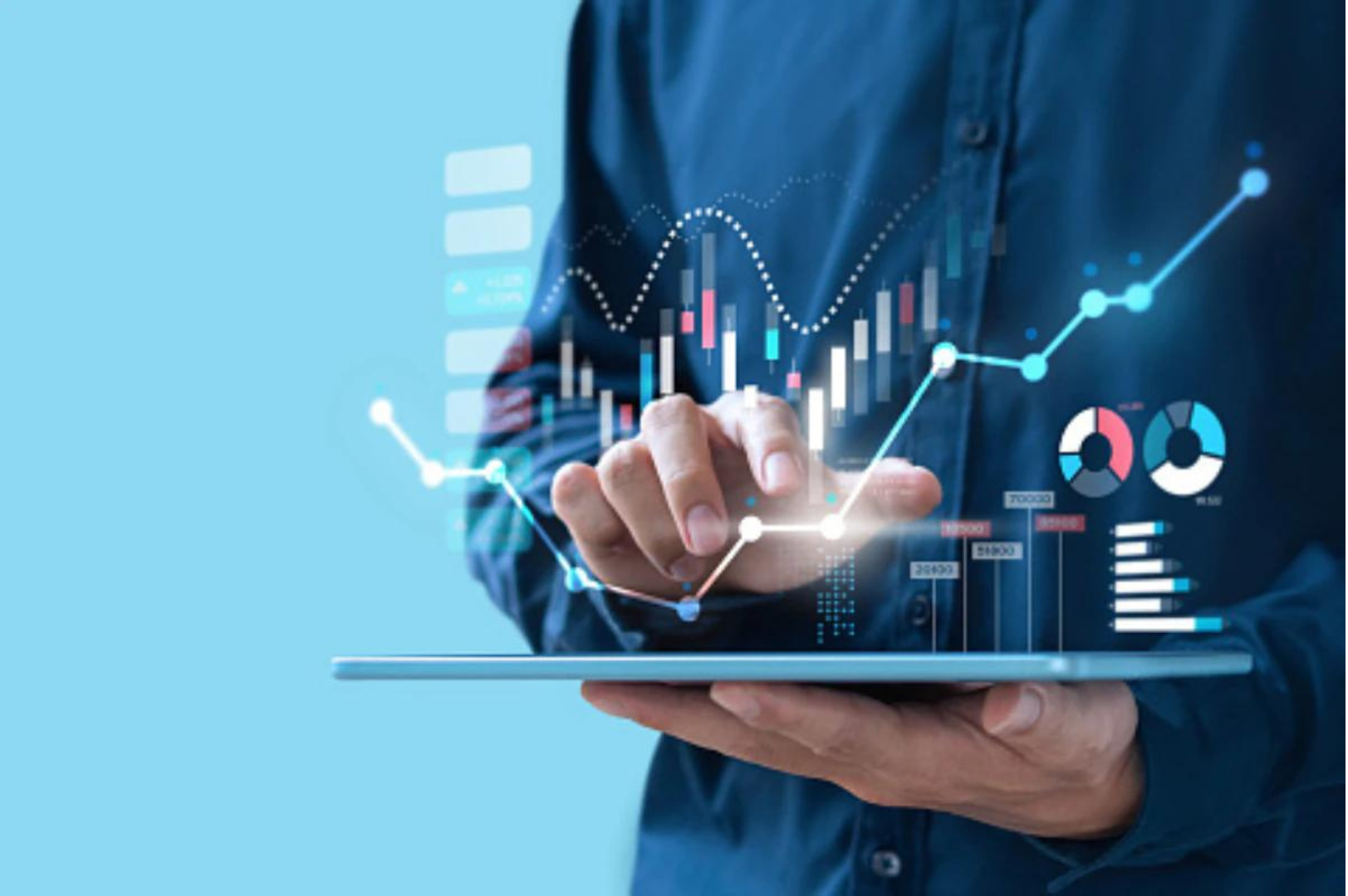 A person analyzing graphs and data on a tablet