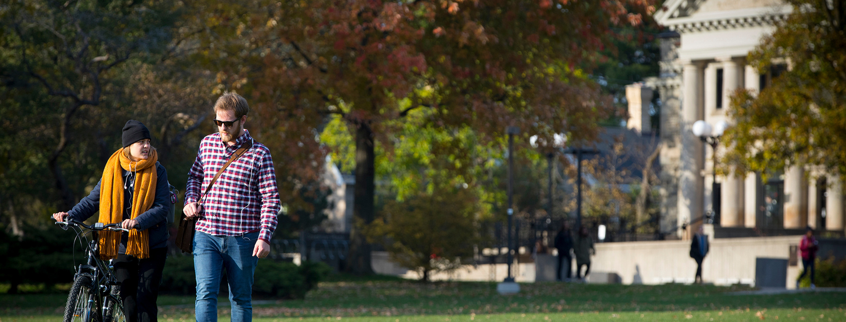 Students walking across Johnston Green