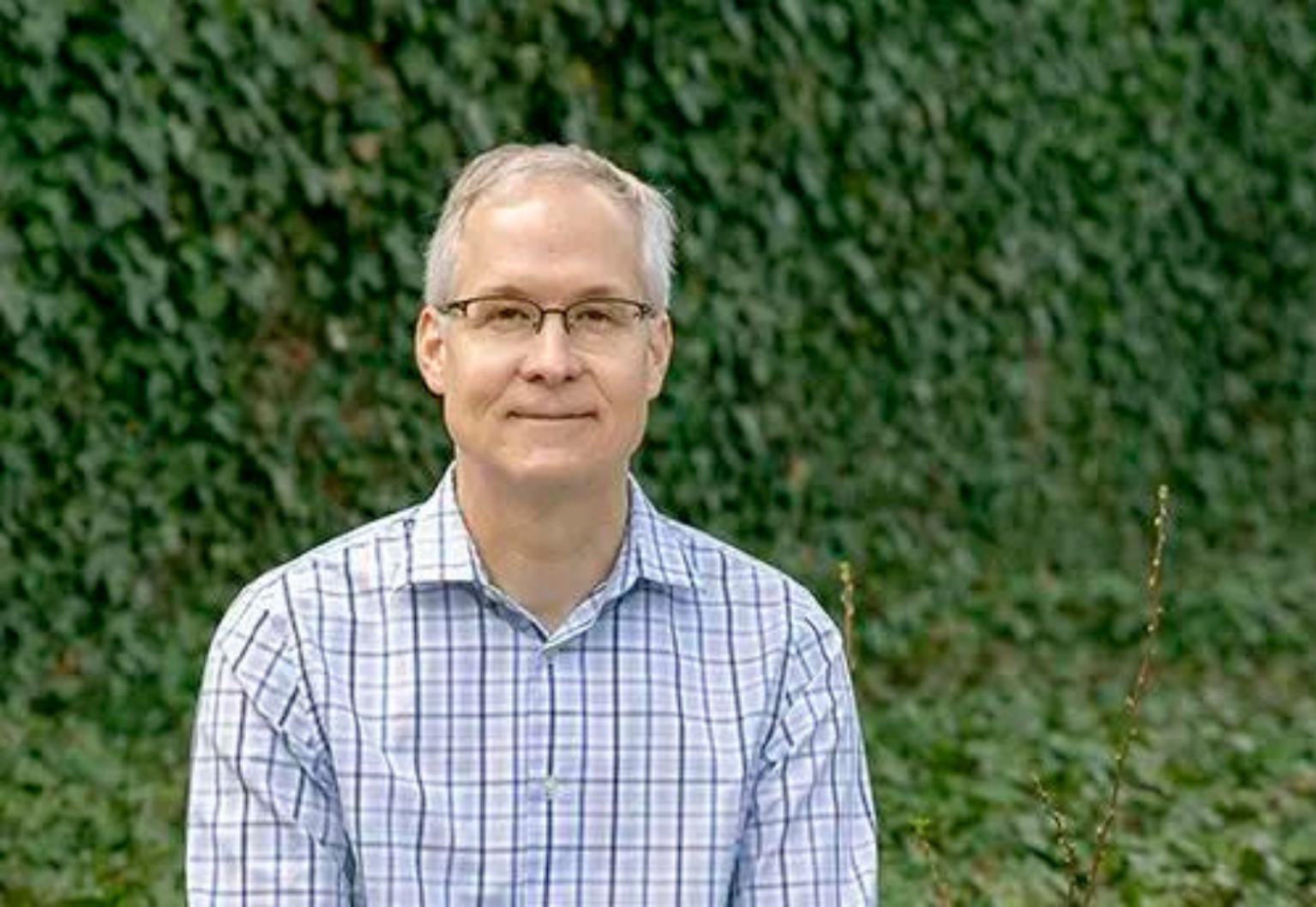 Headshot of Andrew Isaak.