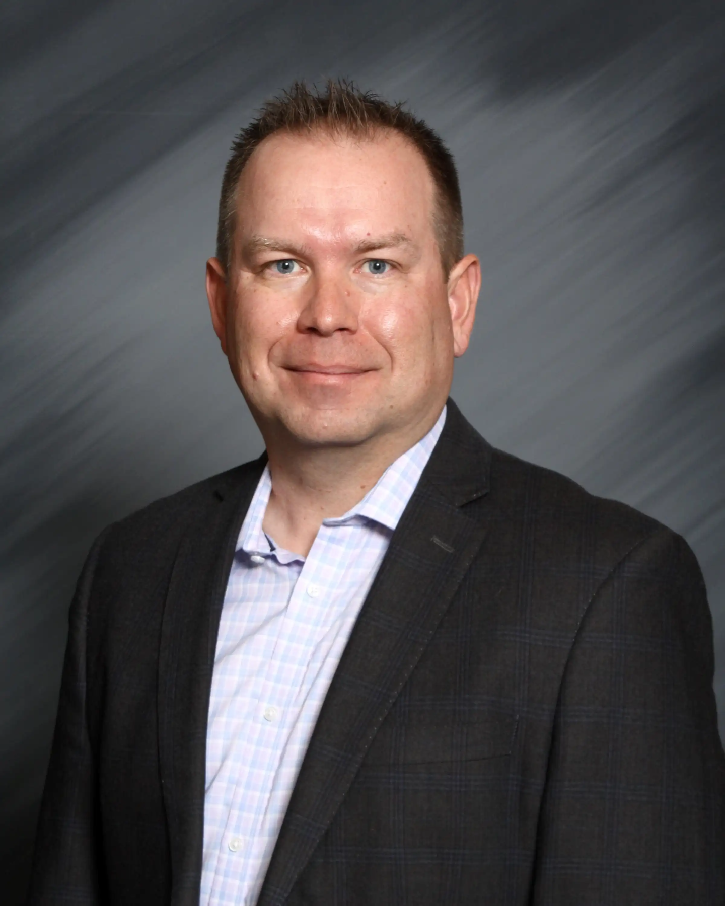 Headshot of Mark Bassingthwaite.