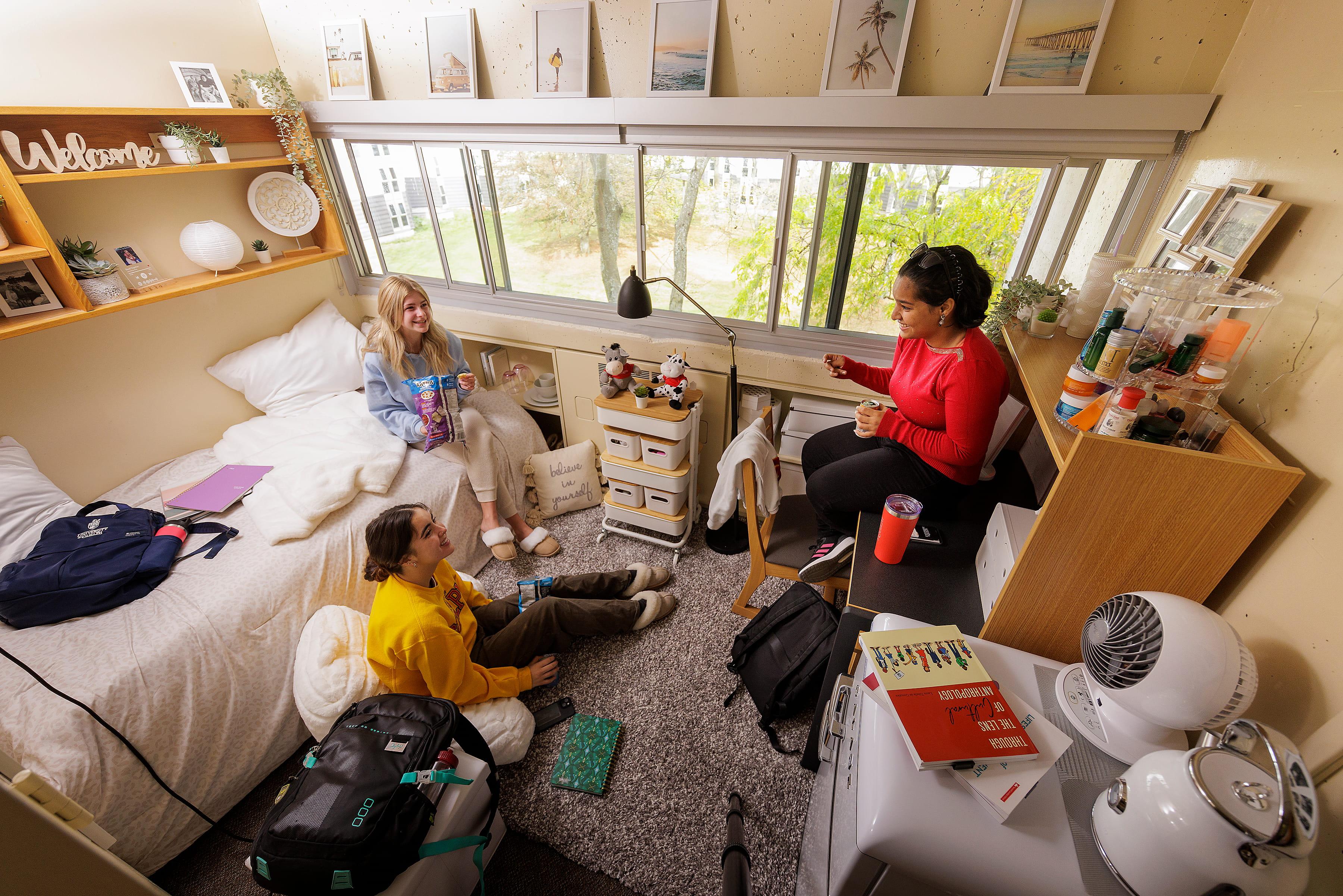 Students sitting in a dorm room