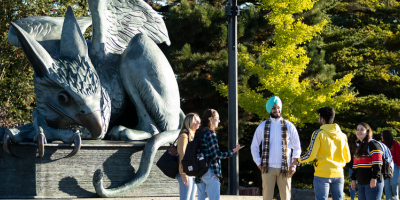 Students in front of the Gryphon Statue