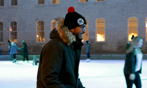 Student skating wearing Snow Days toque