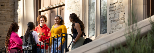 Students talking on steps