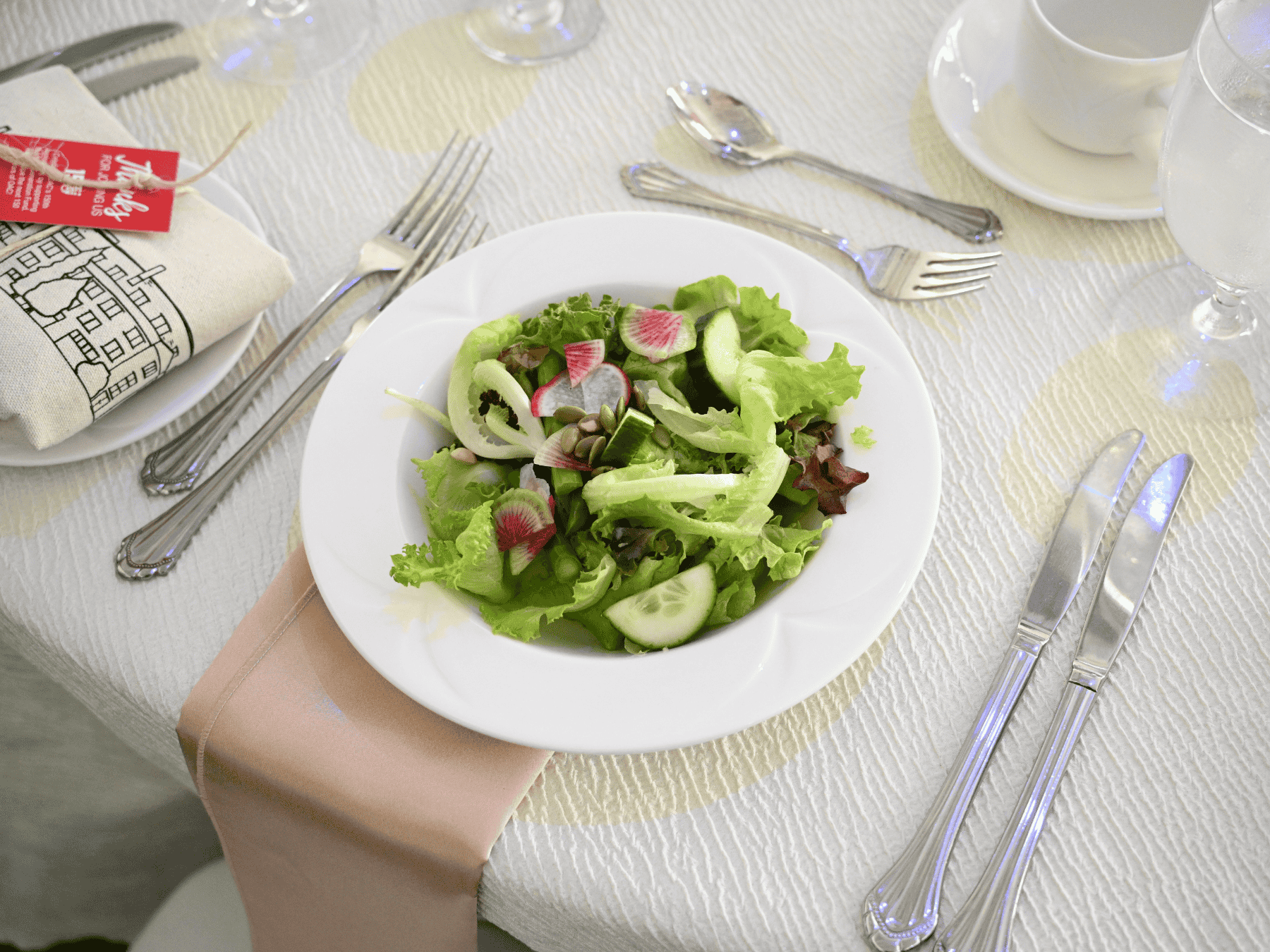 Salad on table with cutlery