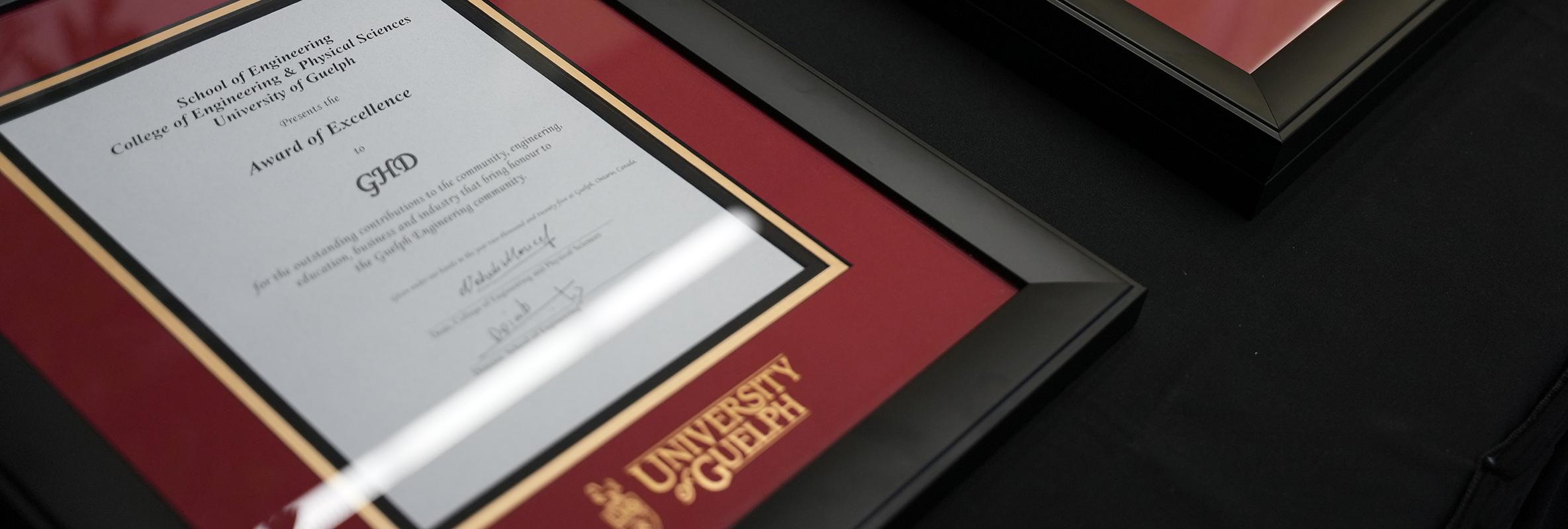 photo of a framed award on a table