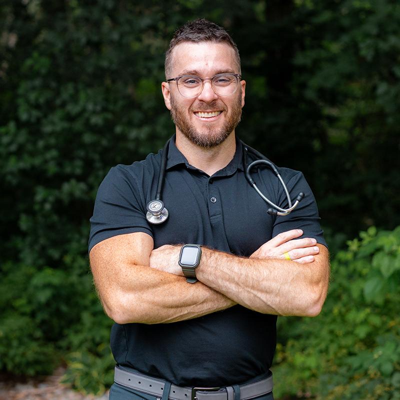Male doctor with a stethoscope around his neck.
