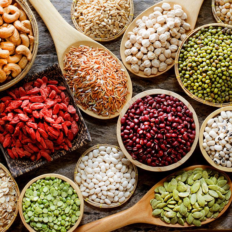 Bowls of legumes, beans and dried veggies.
