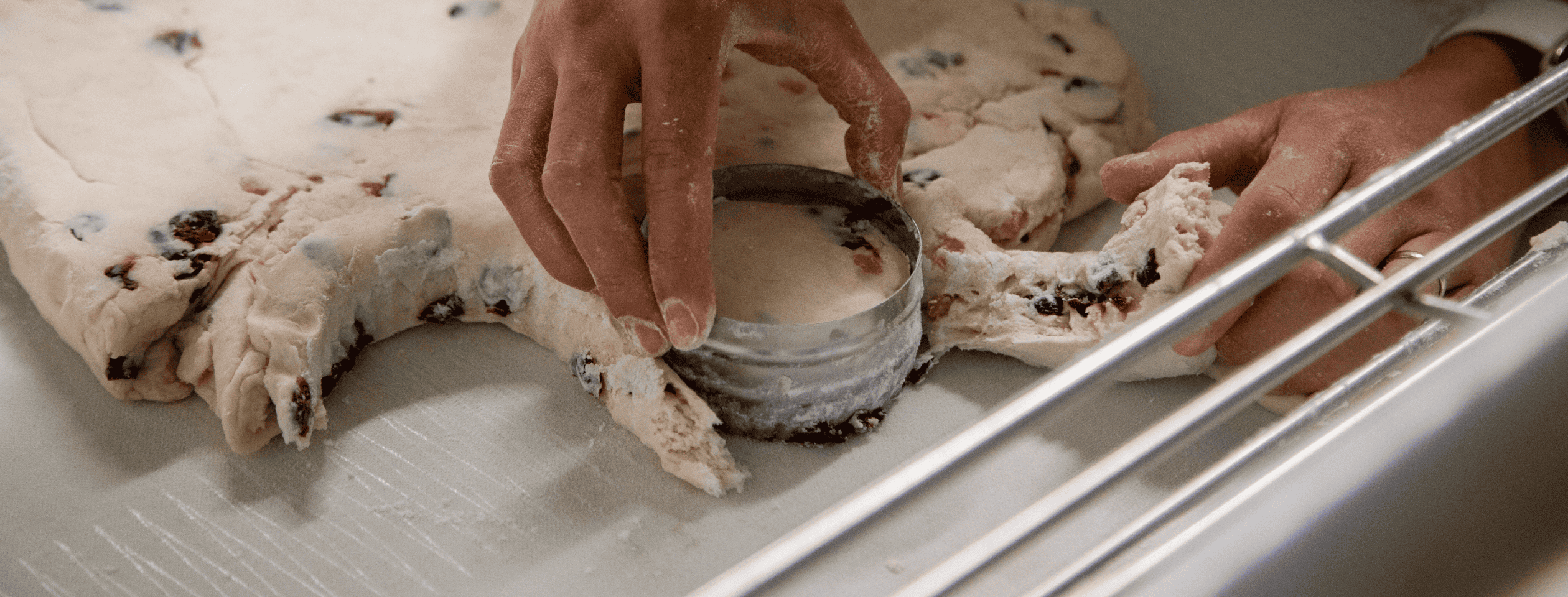 chef using a round mold for scones