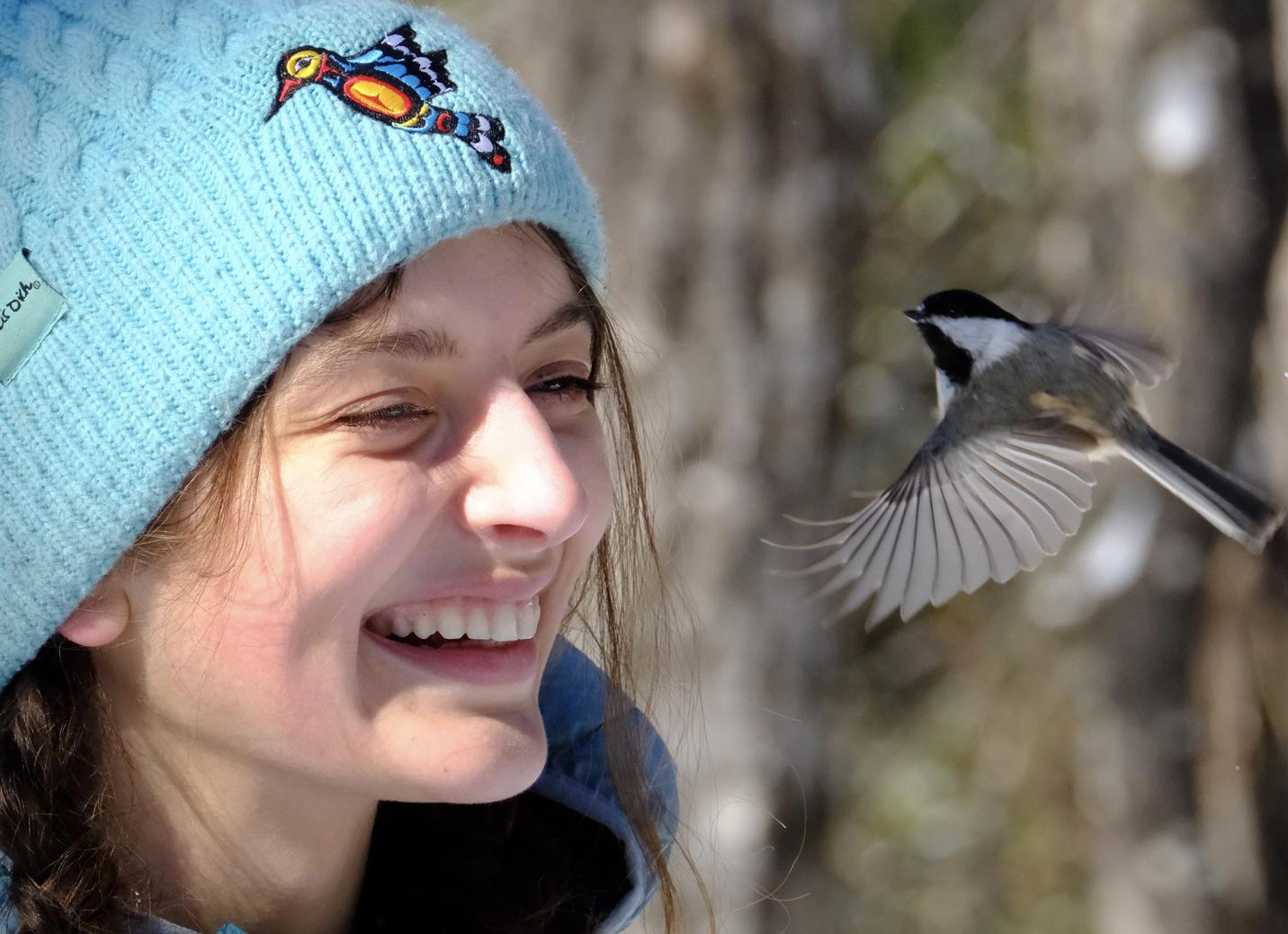 Student and chickadee