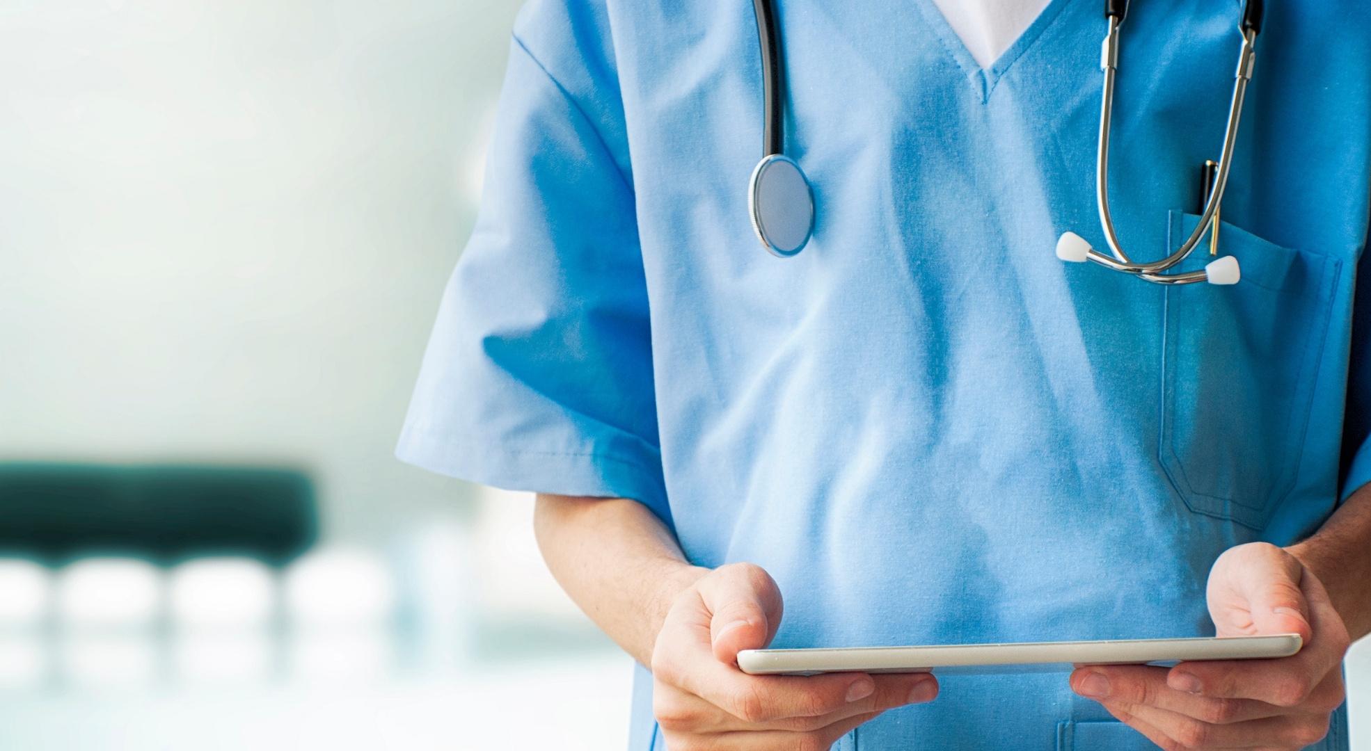 Health-care worker holding a clipboard