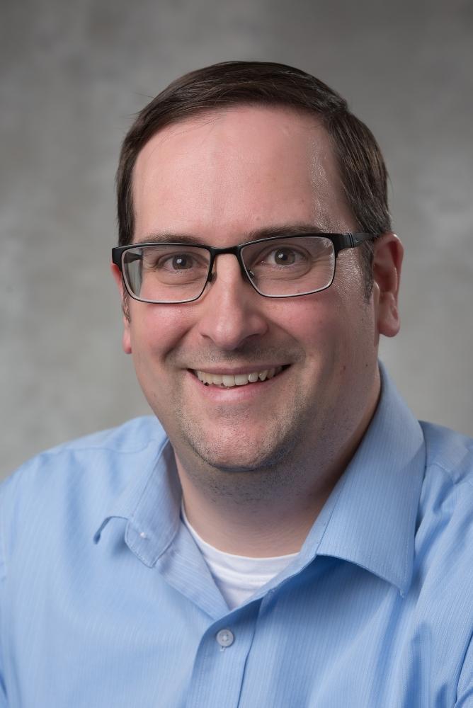 Mark Torcoletti smiling.