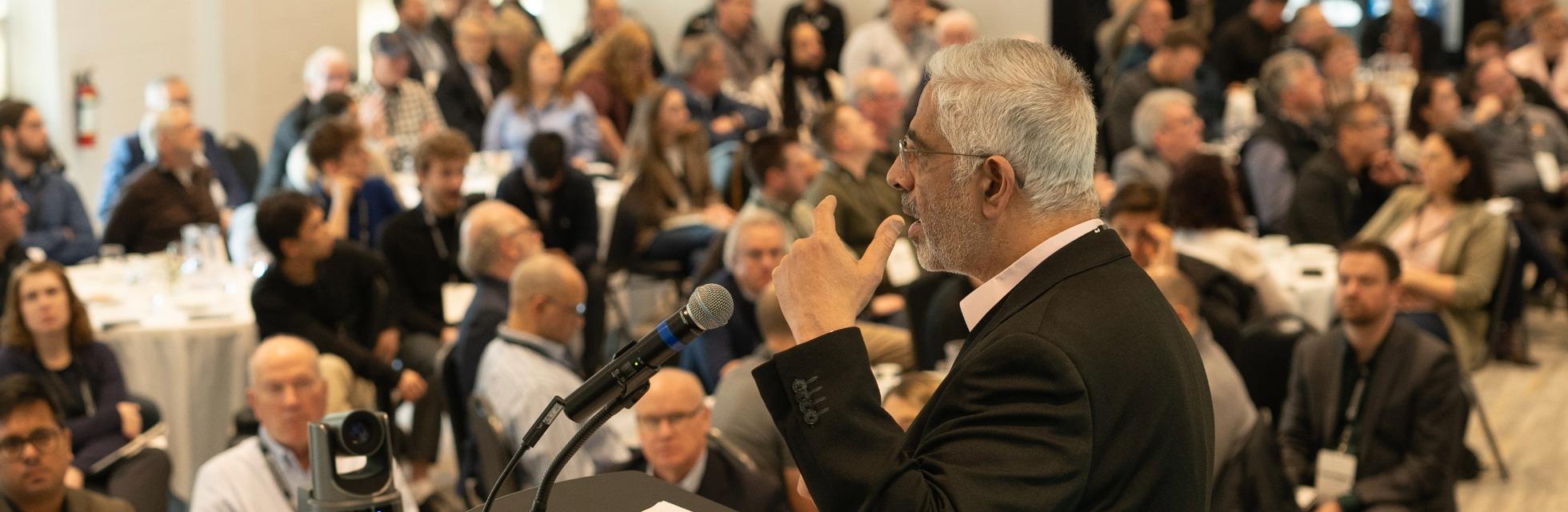 Dr. Medhat Moussa speaking to a crowd.