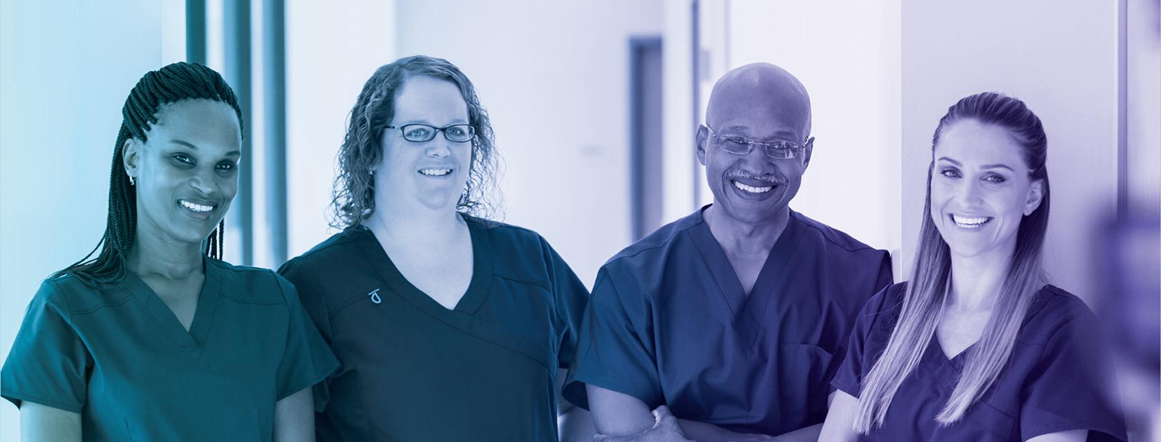 Four PSWs in hospital scrubs.