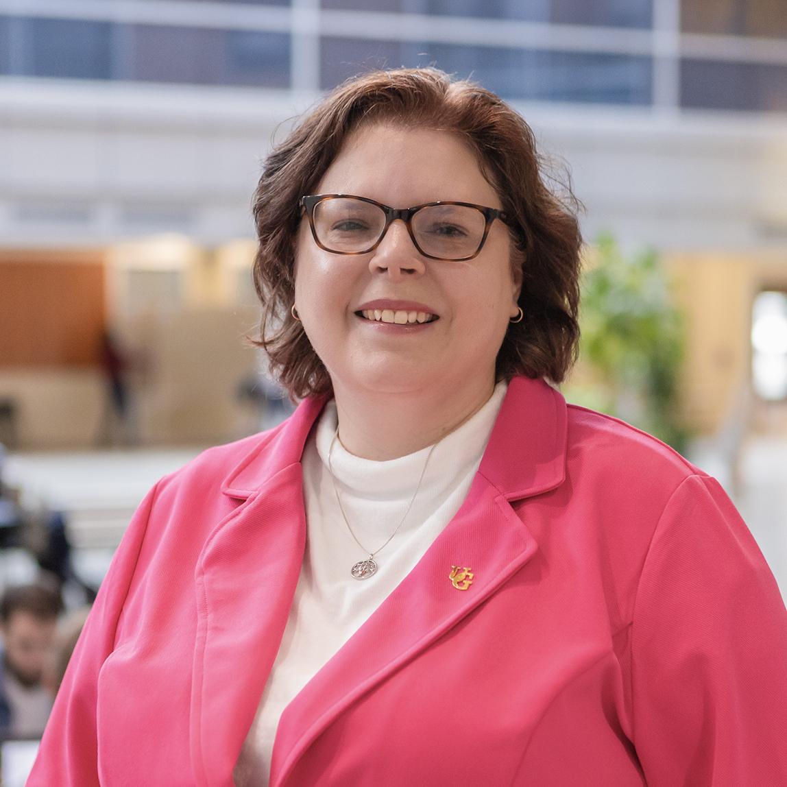 Dr. Stacey Scott smiles at camera while in U of G's Summerlee Science Complex