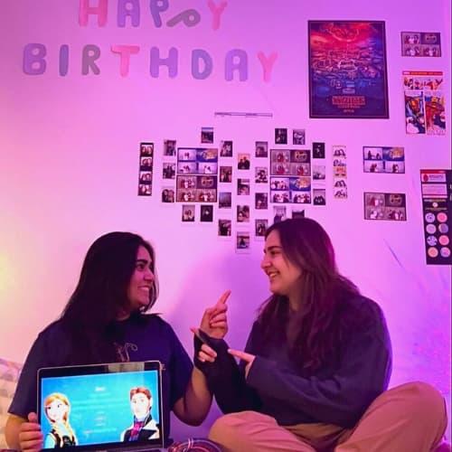 Two roommates talking in the residence room