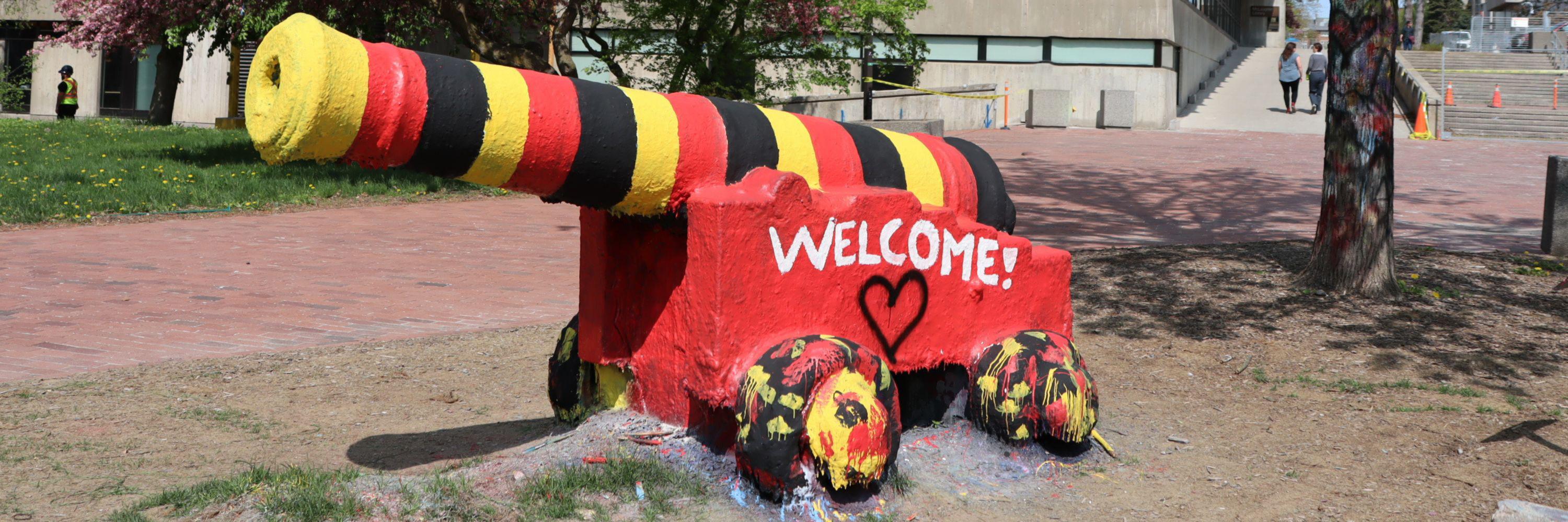 The Cannon painted with WELCOME