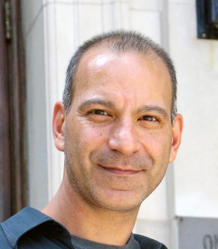 Tarek Saleh smiling