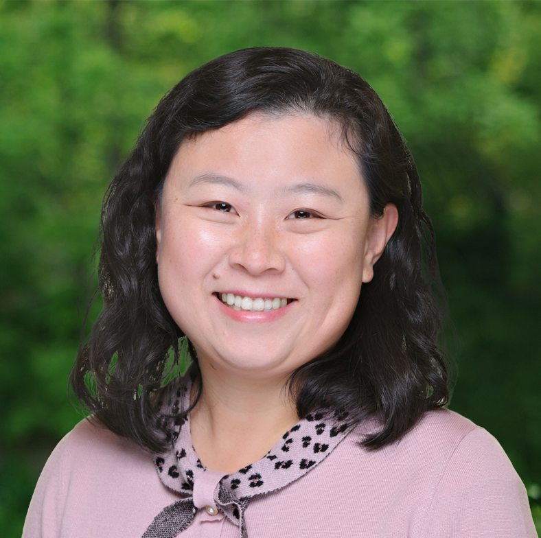 Headshot photo of Karinna Yu