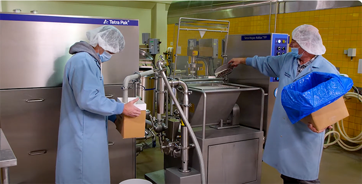 pilot plant with two people making ice cream