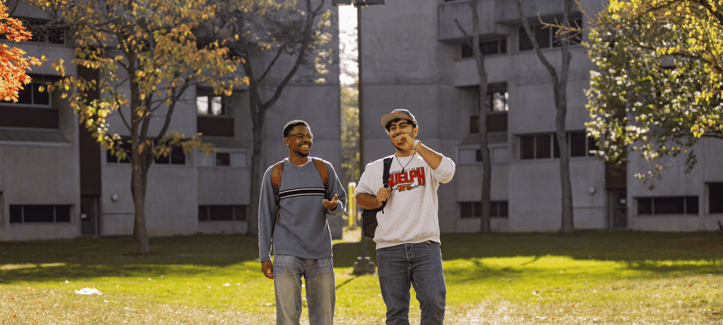 Student walking outside in the fall