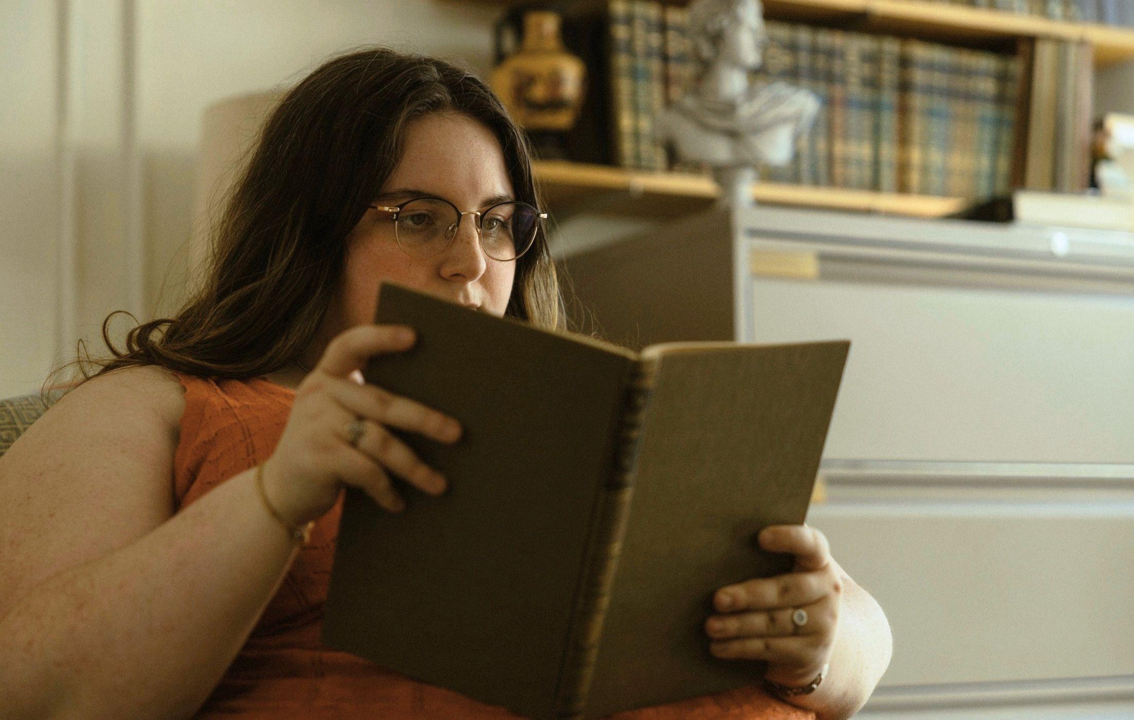 A student reads a book