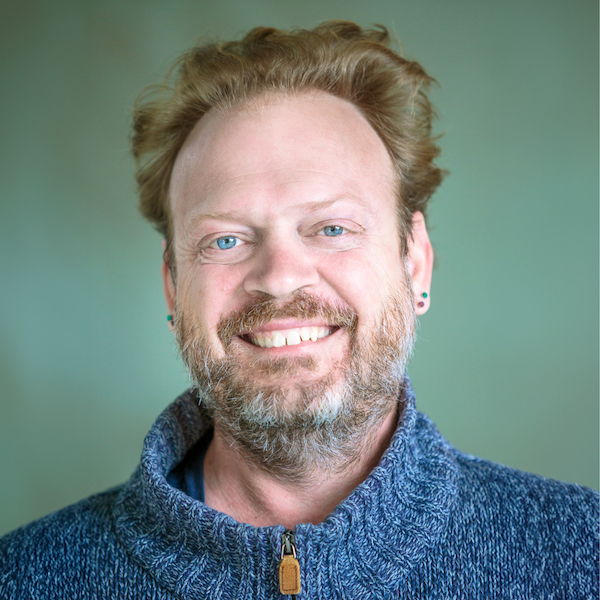 A headshot of Dr. Christopher Hittinger
