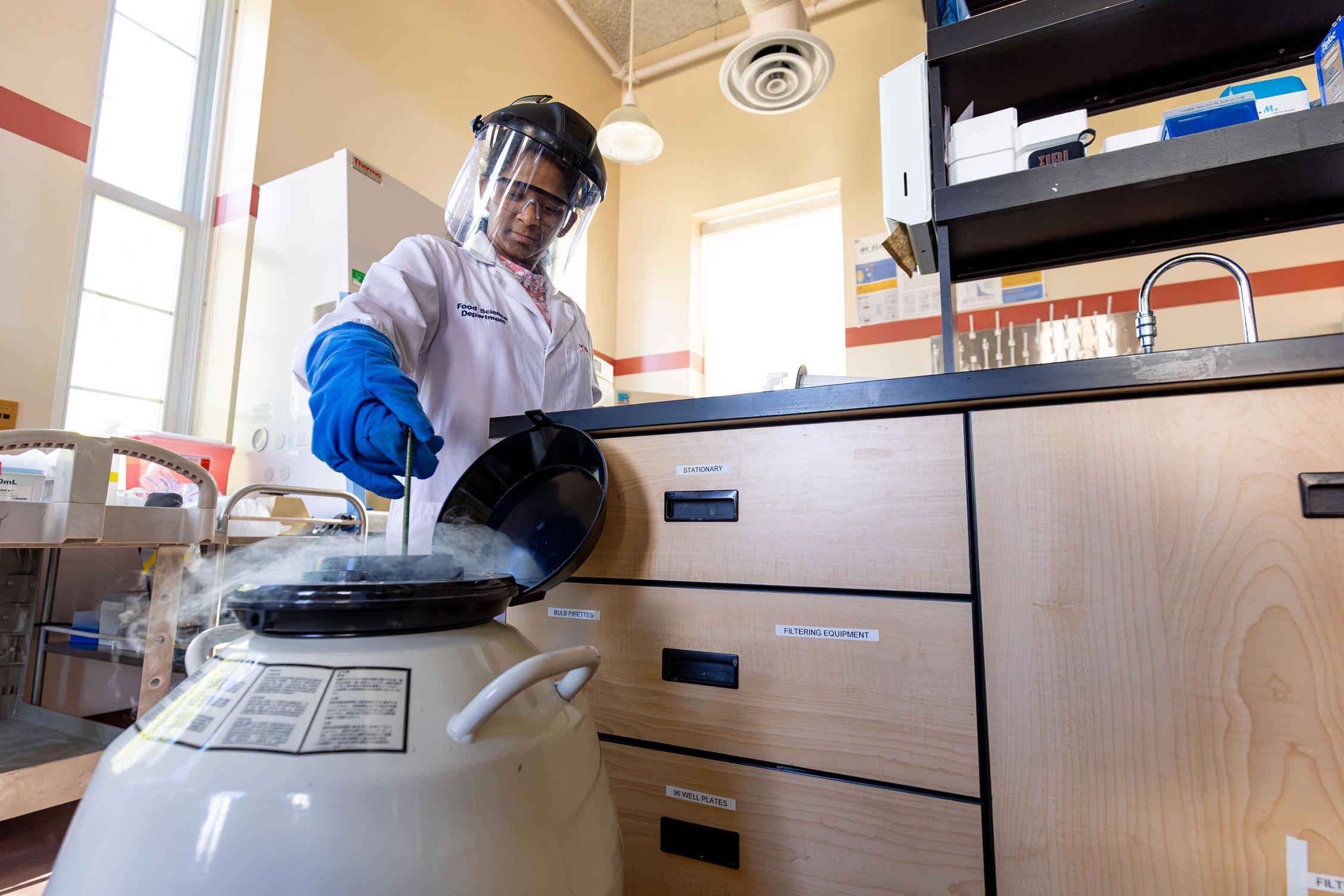 food science student pulling out liquid nitrogen
